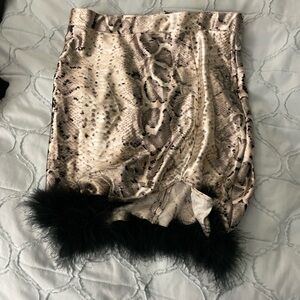 Chic Snake Print Skirt with Black Trim